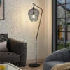 Lindby Benja Lampadaire, Aspect Mailles, Noir 1 Lindby Benja Lampadaire, Aspect Mailles, Noir -EGLO || By Rydens || Lucande Soldes 9921094